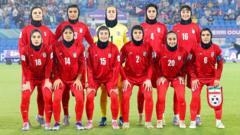 Five Iranian footballers granted Australian visas after anthem protest