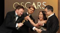 'It's a tie, I'm not joking' - unusual Oscars moment sees two films share award