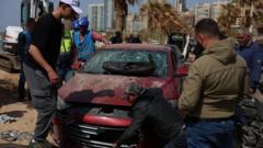 Israel pounds Beirut suburbs after Hezbollah launches rocket barrage